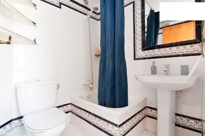 a bathroom with a toilet and a sink at Quiet apartment! Sagrada Familia! in Barcelona
