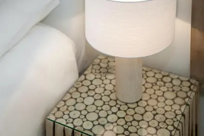 a lamp on top of a table in a room at Casanova Charm 4BDR Apartment in Barcelona