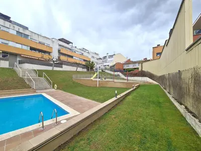 a swimming pool in a yard next to a building at Dolce Terrassa 25 min Barcelona and Beach in Terrassa