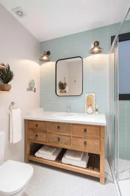 a bathroom with a sink and a mirror at Casa familiar junto al mar en Arenys de Mar in Arenys de Mar