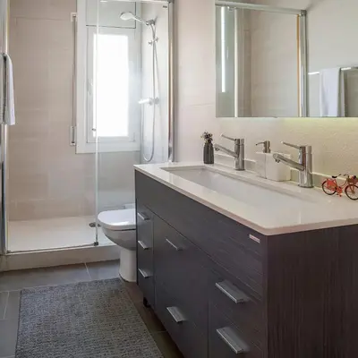 a bathroom with a sink and a toilet and a shower at Comodidad y estilo en Gava near the beach 10 minutes in Viladecáns
