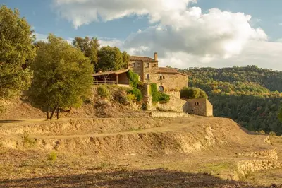 an old house on top of a hill at Masía espectacular cerca de Barcelona in Granera