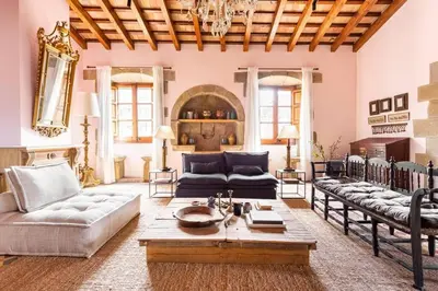 a large living room with couches and a table at Masía espectacular cerca de Barcelona in Granera