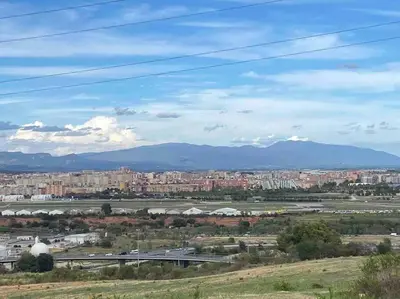 a view of a city with buildings and mountains at Lovely house in Bellaterra (10 min to UAB) in Cerdanyola del Valles