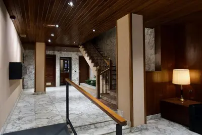 a hallway with a staircase in a house at Corcega - Sagrada Familia in Barcelona