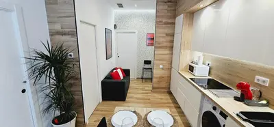 a small kitchen with a sink and a stove at Gran apartamento ideal grupos muy cerca Barcelona in Badalona