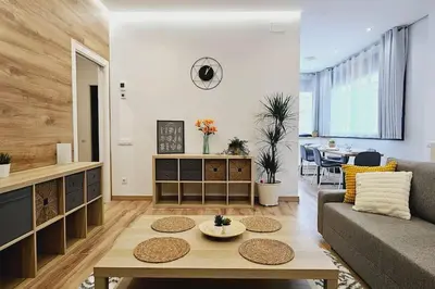 a living room with a couch and a table at apartamento premium muy cerca ciudad Barcelona in Badalona