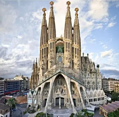 a large building with a clock tower in a city at apartamento premium muy cerca ciudad Barcelona in Badalona