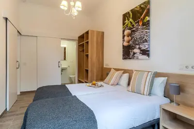 a bedroom with a large white bed in a room at 4190 - AB Comte dUrgell P-I in Barcelona