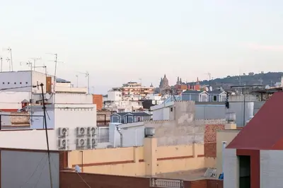 a view of a city skyline with buildings at YOUR HOME- Apartment Camp Nou 2a in Hospitalet de Llobregat