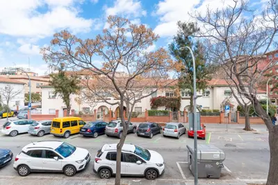 a bunch of cars parked in a parking lot at La Sagrera House in Barcelona
