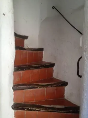 a set of brick stairs in a room at Canela Homes BARCELONA BORN in Barcelona