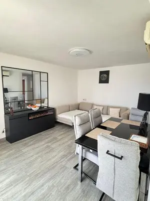 a living room with a couch and a table at Apartamento Forum in Barcelona