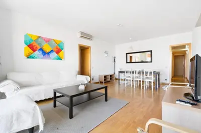 a living room with a couch and a table at Families & Groups 4BR2BA by Sagrada in Barcelona