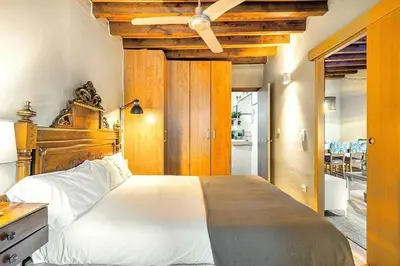 a kitchen with a stove and a dishwasher at The Collection Barcelona - Paseo de Gracia sunny 2BR penthouse in Barcelona