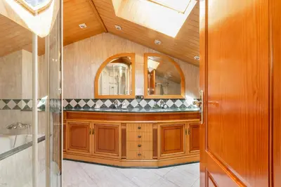 a bathroom with a shower and a mirror at Large 5-Bed Villa, mountain and beach, at 30' from Barcelona & 10' from F1 Circuit in Vallromanas
