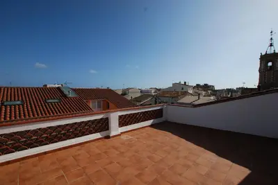 a balcony with a view of a city at Sant Guillem in Vilassar de Mar