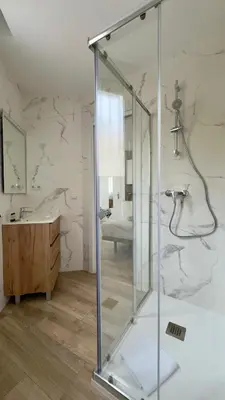 a bathroom with a shower and a sink at Crysoyle Apartment II Barcelona Next to Camp Nou in Hospitalet de Llobregat