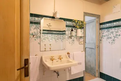 a bathroom with a sink and a mirror at Casa Victor Riu in Piera