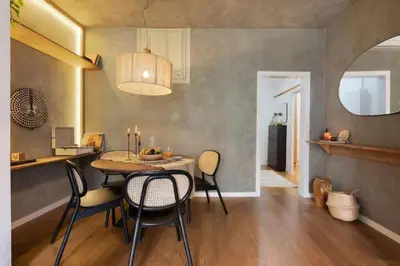 a kitchen and dining room with a table and chairs at Bantu - 1 bedroom and balcony in Eixample Esquerra in Barcelona