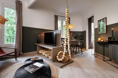 a living room with a couch and two tables at Vili - 2 bedrooms and balcony in Sant Antoni in Barcelona