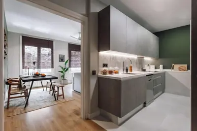 an office with a desk and chairs in a room at Songe - 2 bedroom in Eixample Esquerra in Barcelona