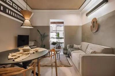 a dining room with a table and chairs at Bambuti - 3 bedrooms and balcony in Passeig Sant Joan in Barcelona