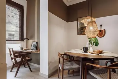 a bedroom with a large black cabinet with baskets on it at Zioba - 3 bedroom and balcony in Gracia in Barcelona
