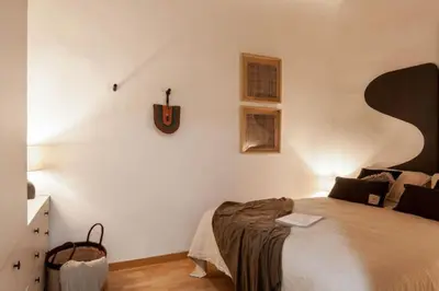 a living room with a couch and a table at Kakwa - 2 bedroom and balcony Eixample Esquerra in Barcelona