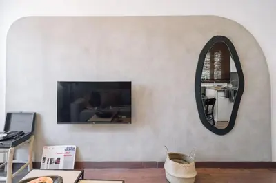 a bedroom with a bed and a lamp in it at Bolia - 2 bedrooms in Eixample Esquerra in Barcelona