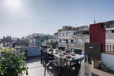 a bedroom with a bed and a window at Baka - 2 bedroom with terrace in Sant Gervasi in Barcelona