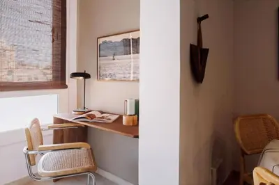 a black hammock hanging on a wall in a bathroom at Hemba - 3 bedroom and balcony in Gracia in Barcelona