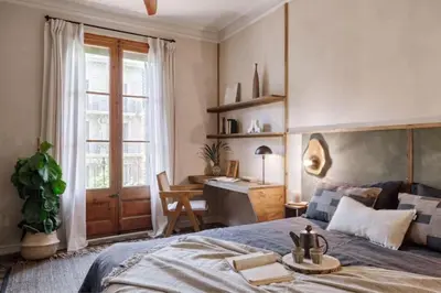 a dining room with a table and chairs at Ulindi - 2 bedroom with balcony in Eixample Esquerra in Barcelona