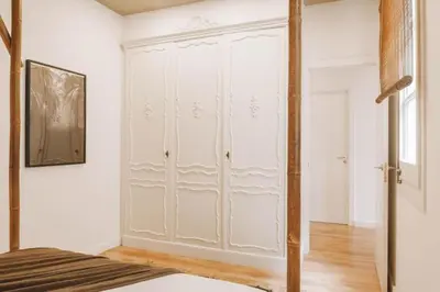 a living room with a couch and a table at Sanga - 2 bedroom in Eixample Esquerra in Barcelona