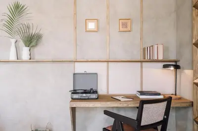 a living room with a couch and a dining room table at Salonga - 1 bedroom and balcony in Eixample Esquerra in Barcelona