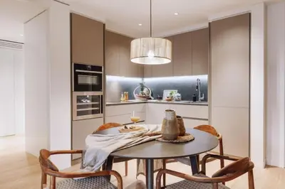 a counter with baskets of fruit on a counter top at Bemba - 1 bedroom and swimming pool in Passeig de Gracia in Barcelona