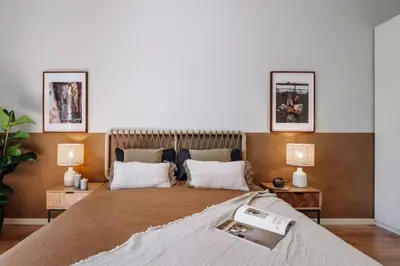 a hallway with a door leading into a room with a bedroom at Luiza - 3 bedroom in Eixample Dreta in Barcelona
