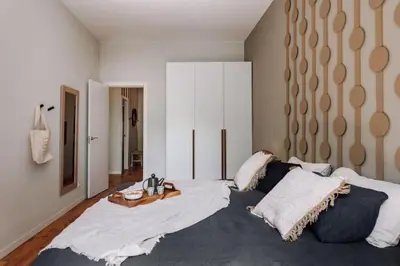 a bathroom with a tub and a sink and a mirror at Luiza - 3 bedroom in Eixample Dreta in Barcelona
