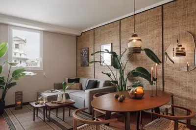 a living room with a couch and a table at Zamba - 2 bedroom in Passeig de Gracia in Barcelona