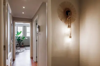 a living room with a couch and a table at Zamba - 2 bedroom in Passeig de Gracia in Barcelona