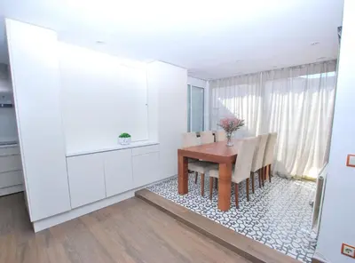 a dining room with a table and chairs at Rey apartment in Vilassar de Mar