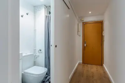 a bathroom with a toilet and a walk in shower at 2124 - AB Poblenou Beach Comfort in Barcelona