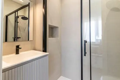 a bathroom with a sink and a shower at Vista Serena in Sant Cugat del Vallès