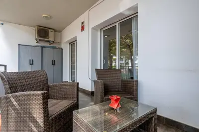 a red star sitting on a table in a room at Beachside Bliss in Castelldefels