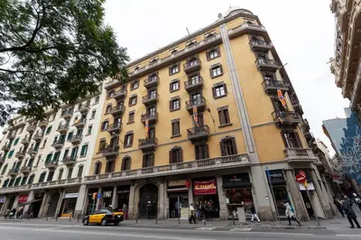 a large building on the corner of a street at AinB B&B Born-Via Laietana in Barcelona