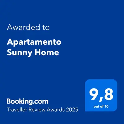 a blue screen with the text upgraded to apartmentirmo sunny home at Apartamento Sunny Home in Cunit