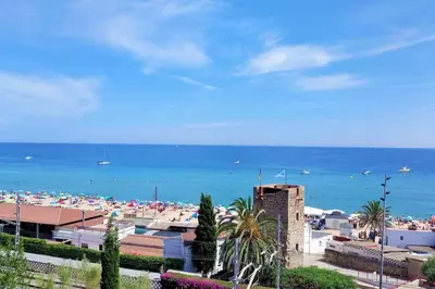 a view of a beach with a crowd of people at OASIS BEACH-CITY apartment in Montgat