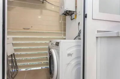 a washer and dryer in a small room at 