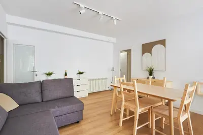 a living room with a table and a couch at 