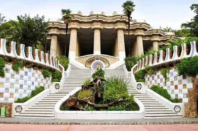 a building with stairs and a fountain in front of it at Penthouse 100m from Sea with Terrace, Near BCN in Mataró